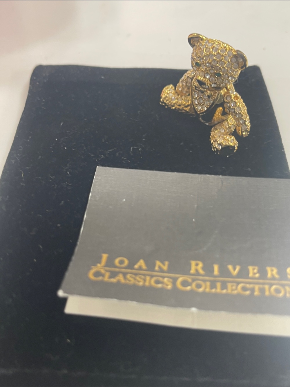 Retired Joan Rivers Gold Tone Bear Brooch with Clear and emerald Crystals